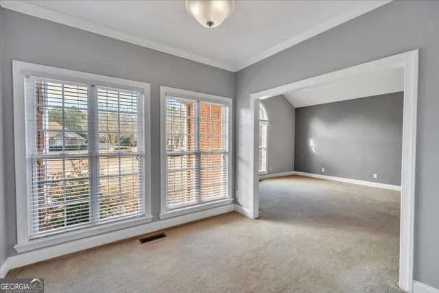 a bathroom with a granite countertop sink a mirror a shower and a bathtub