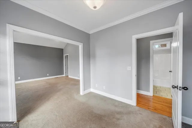 a view of storage and utility room with racks on the wall