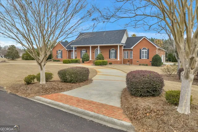a view of an empty room with a fireplace