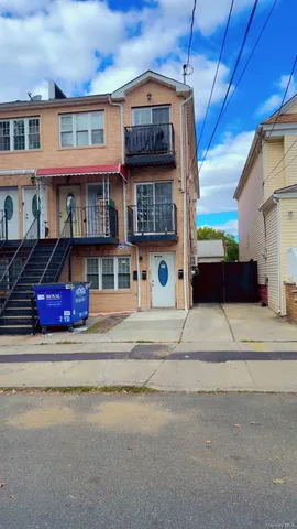 a view of a car parked in front of a building