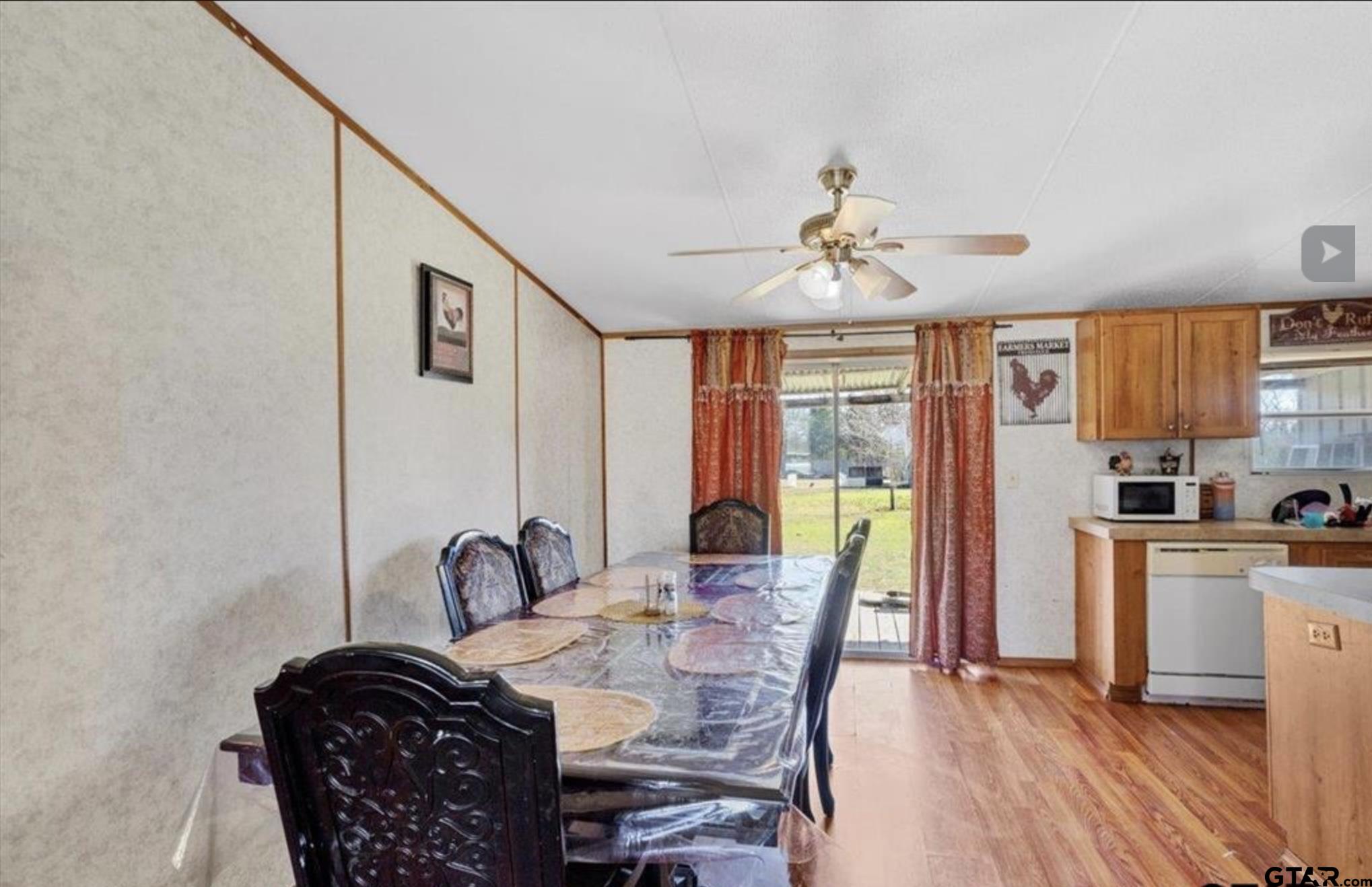 865 County Road Saltillo, TX 75478 - Photo 18 of 22 a view of a dining room with furniture window and outside view