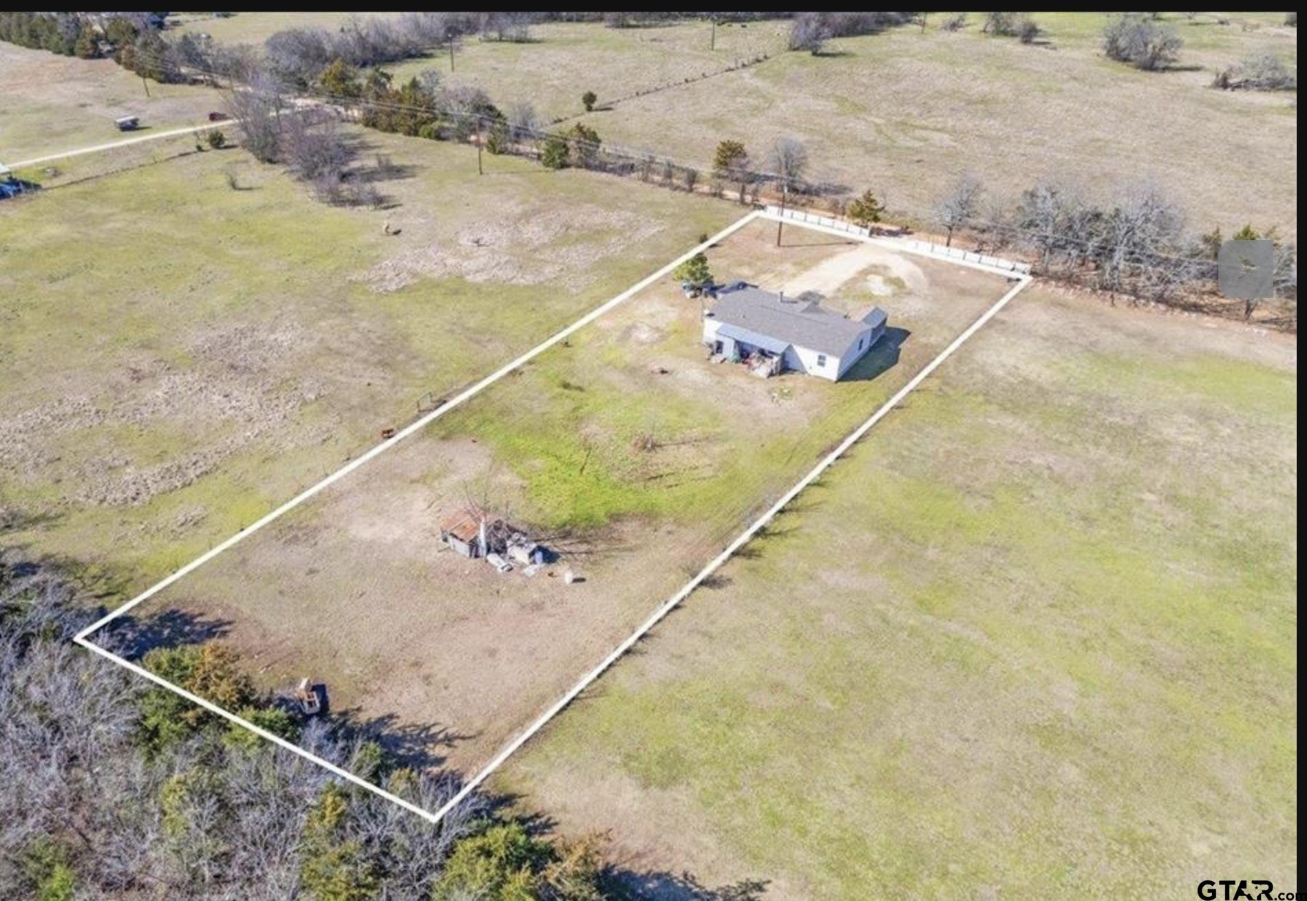 865 County Road Saltillo, TX 75478 - Photo 2 of 22 a view of a terrace