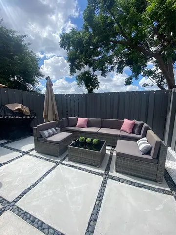 a view of outdoor space with seating