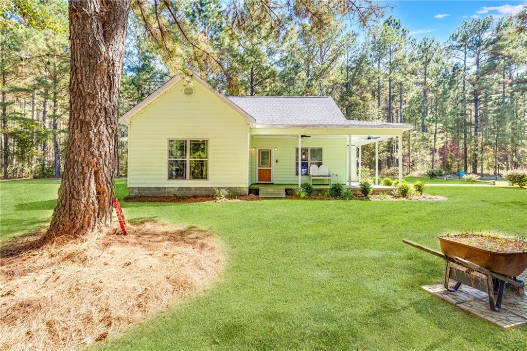 110 Bethel Village Road Eastman, GA 31023 - Photo 24 of 32 a house view with a garden space