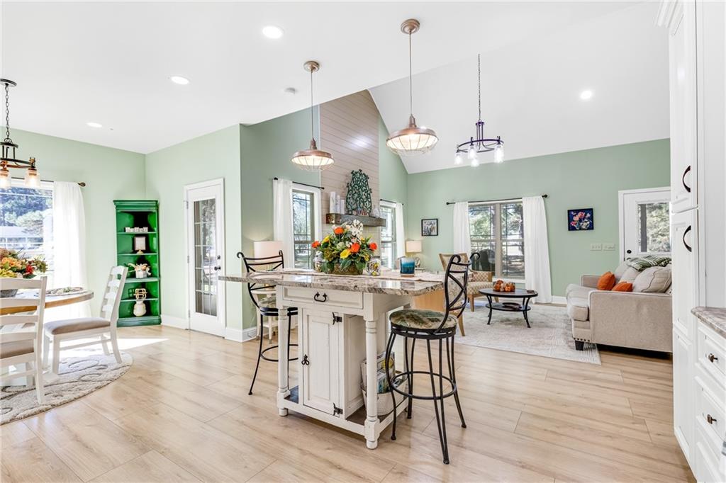 110 Bethel Village Road Eastman, GA 31023 - Photo 25 of 32 a view of a dining room with furniture and wooden floor