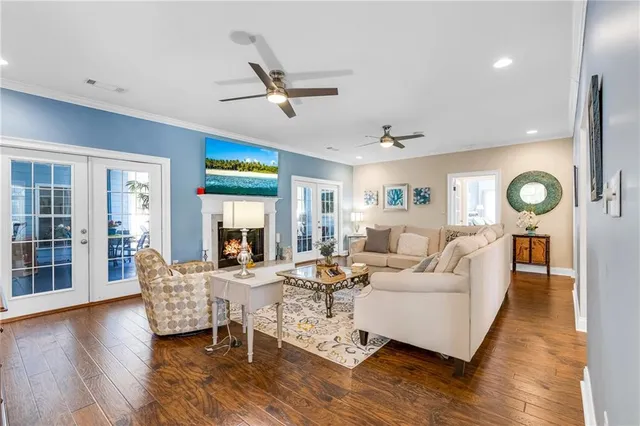 a view of livingroom with furniture window and wooden floor