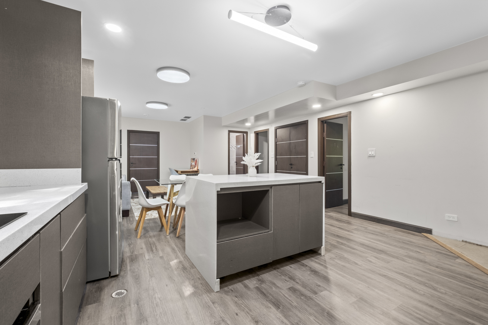 2307 Lake Street, Unit 2 Evanston, IL 60201 - Photo 14 of 20 a living room with stainless steel appliances kitchen island granite countertop furniture wooden floor and a view of living room