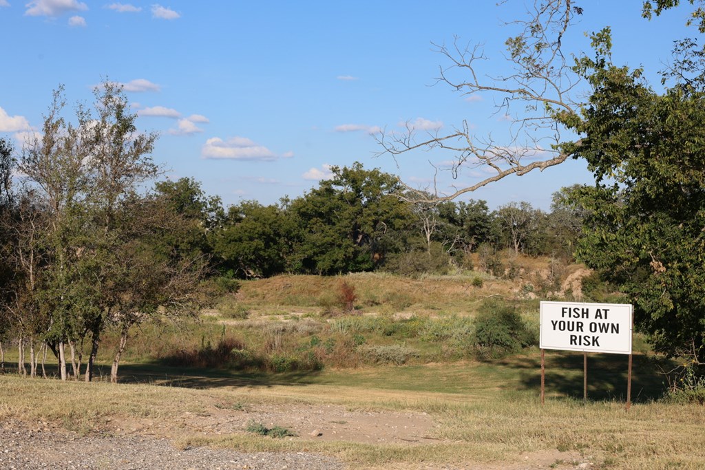 4584 Highway 290, Unit 252 Fredericksburg, TX 78624 - Photo 8 of 16 a sign board with ocean view