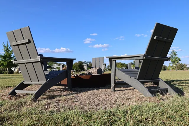 a view of a park with houses