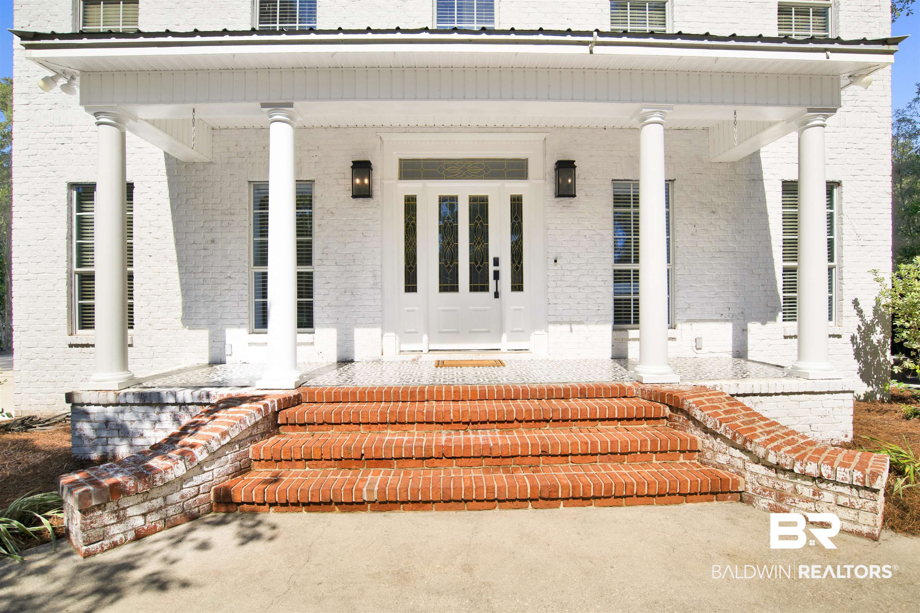 11835 Island Drive Foley, AL 36535 - Photo 48 of 53 Doorway to property with covered porch and brick siding