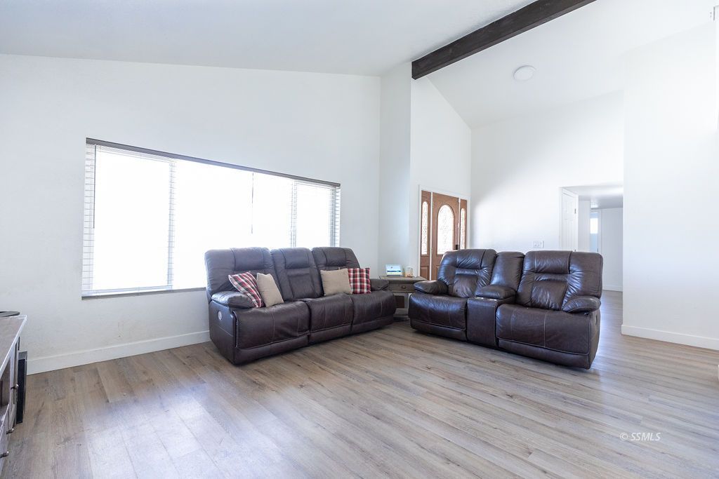 538 North Rio Bravo Street Ridgecrest, CA 93555 - Photo 7 of 45 a living room with furniture and a window