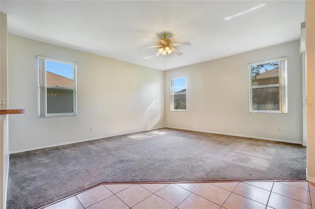 a view of a kitchen with a sink and a microwave