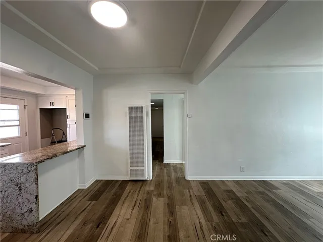 a view of a kitchen from the hallway