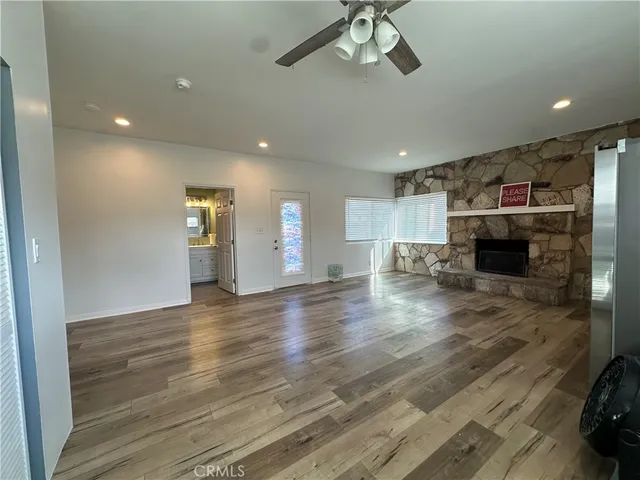 a bathroom with a toilet sink and shower