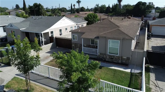 an aerial view of a house with swimming pool