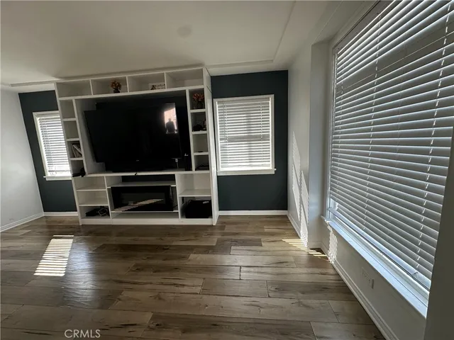 a view of living room with furniture and flat screen tv