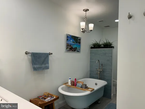 a bathroom with a sink double vanity and a mirror