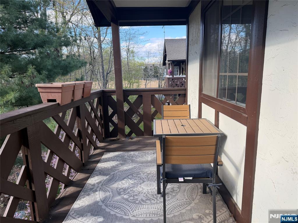 2308 Hemingway Lane, Unit 2308 Mahwah, NJ 07430 - Photo 13 of 16 a view of a balcony with chairs