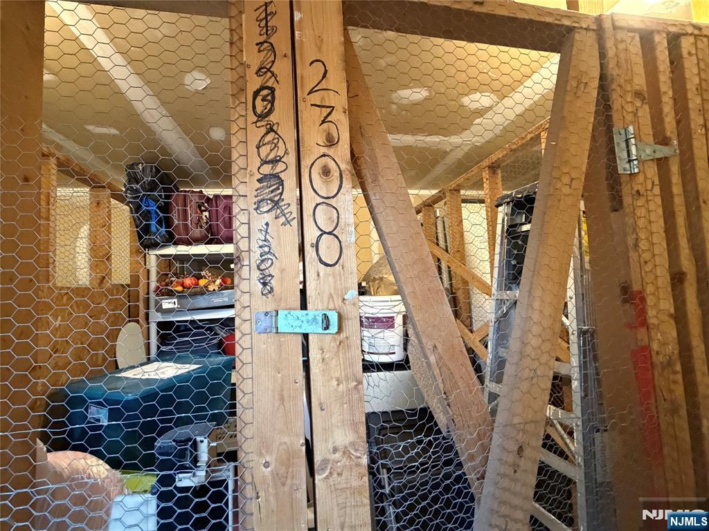 2308 Hemingway Lane, Unit 2308 Mahwah, NJ 07430 - Photo 14 of 16 a bath room with a table and a stove