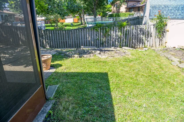 a view of swimming pool from a garden