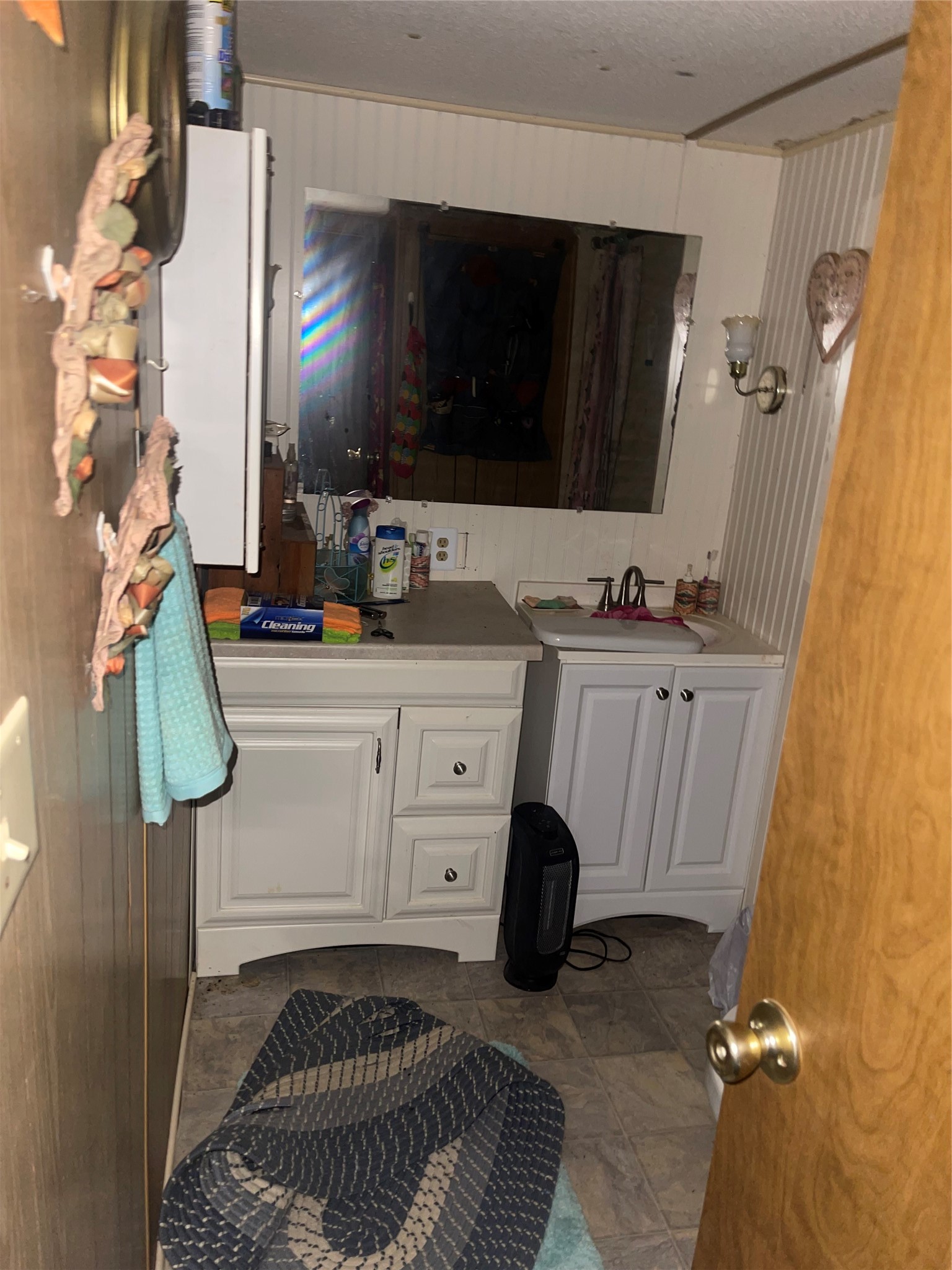 220 Ramp Way Trinity, TX 75862 - Photo 5 of 8 a bathroom with a sink and a mirror