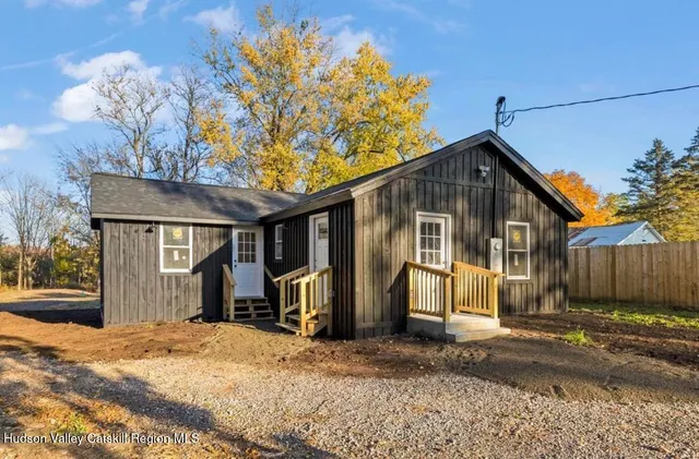 a front view of a house having yard