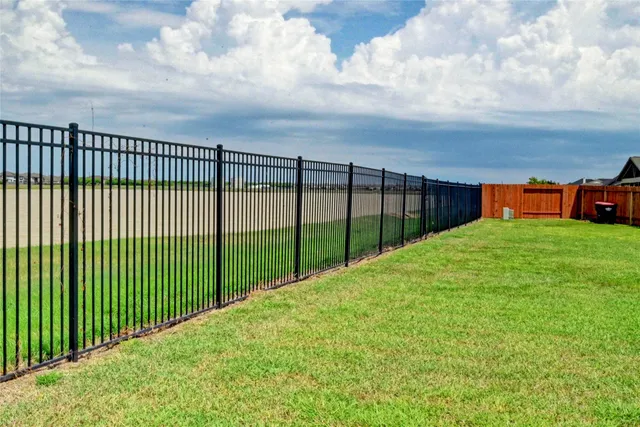a view of a backyard with a garden