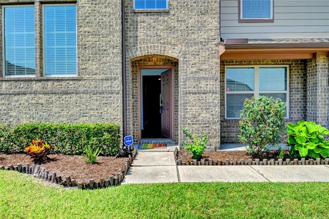 a front view of a house with an outdoor space