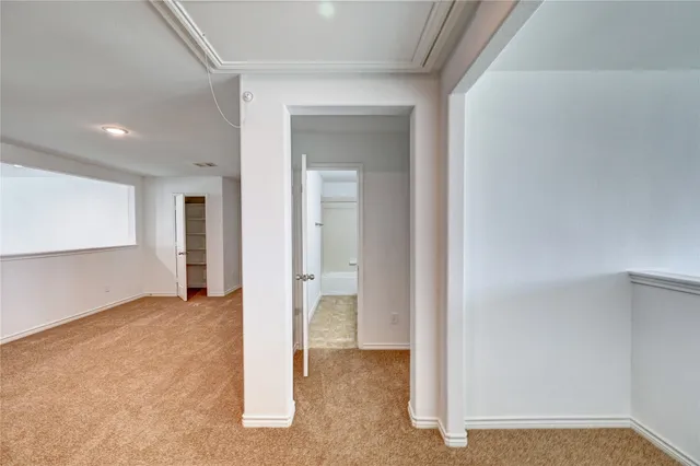 a view of a room with a hallway