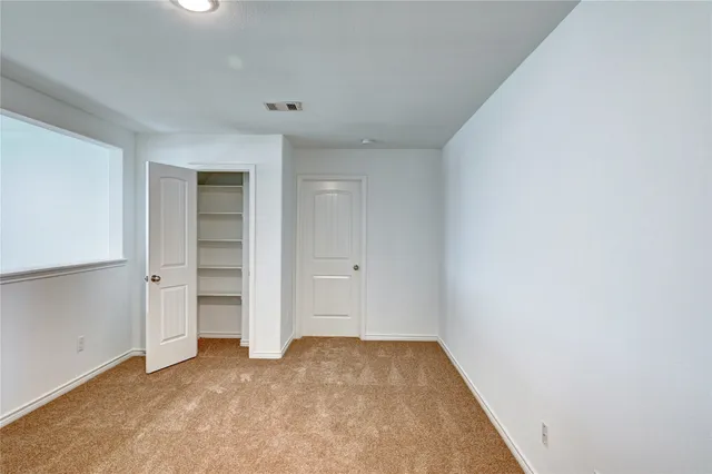an empty room with closet