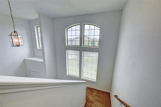 a view of an entryway with sitting area