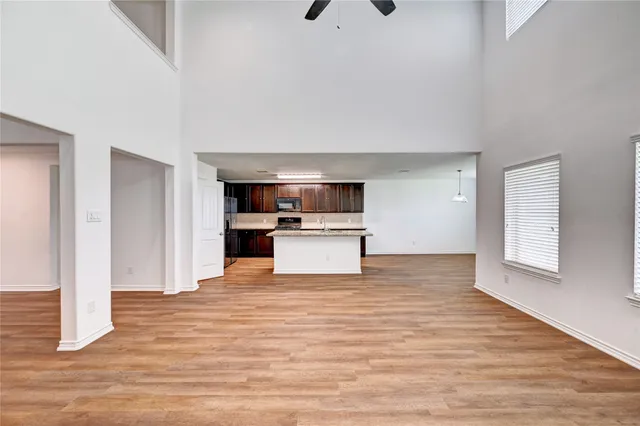 a view of kitchen with wooden floor