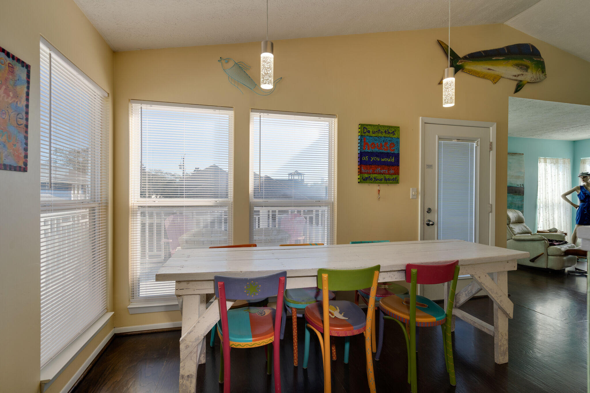 80 Buddy Street Santa Rosa Beach, FL 32459 - Photo 14 of 46 a view of a dining room with furniture and wooden floor