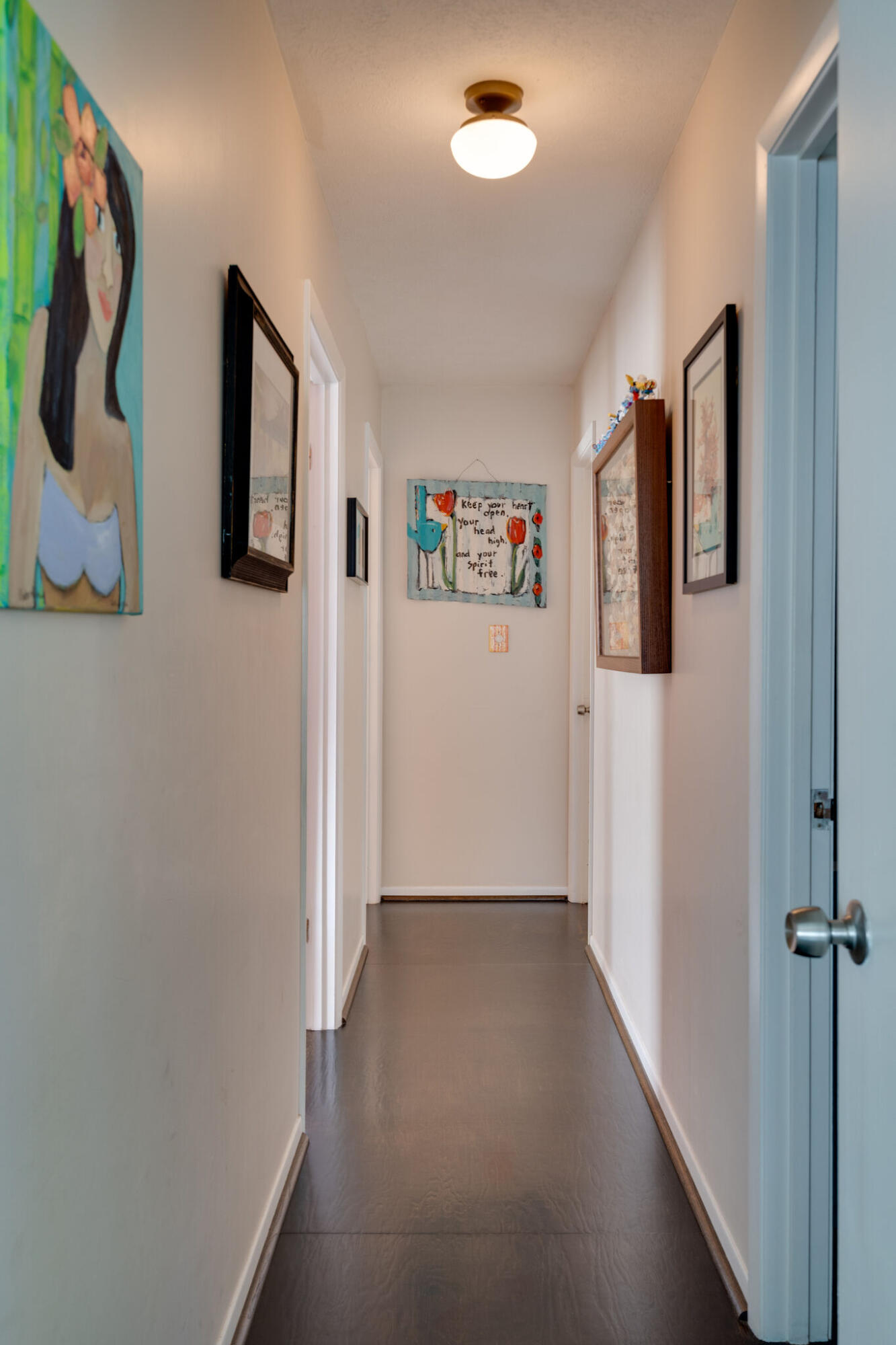 80 Buddy Street Santa Rosa Beach, FL 32459 - Photo 20 of 46 a view of hallway with painting on the wall and a window