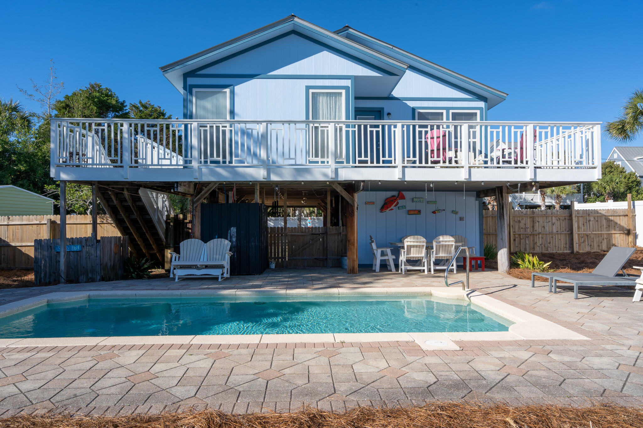 80 Buddy Street Santa Rosa Beach, FL 32459 - Photo 2 of 46 a front view of a house with porch and furniture