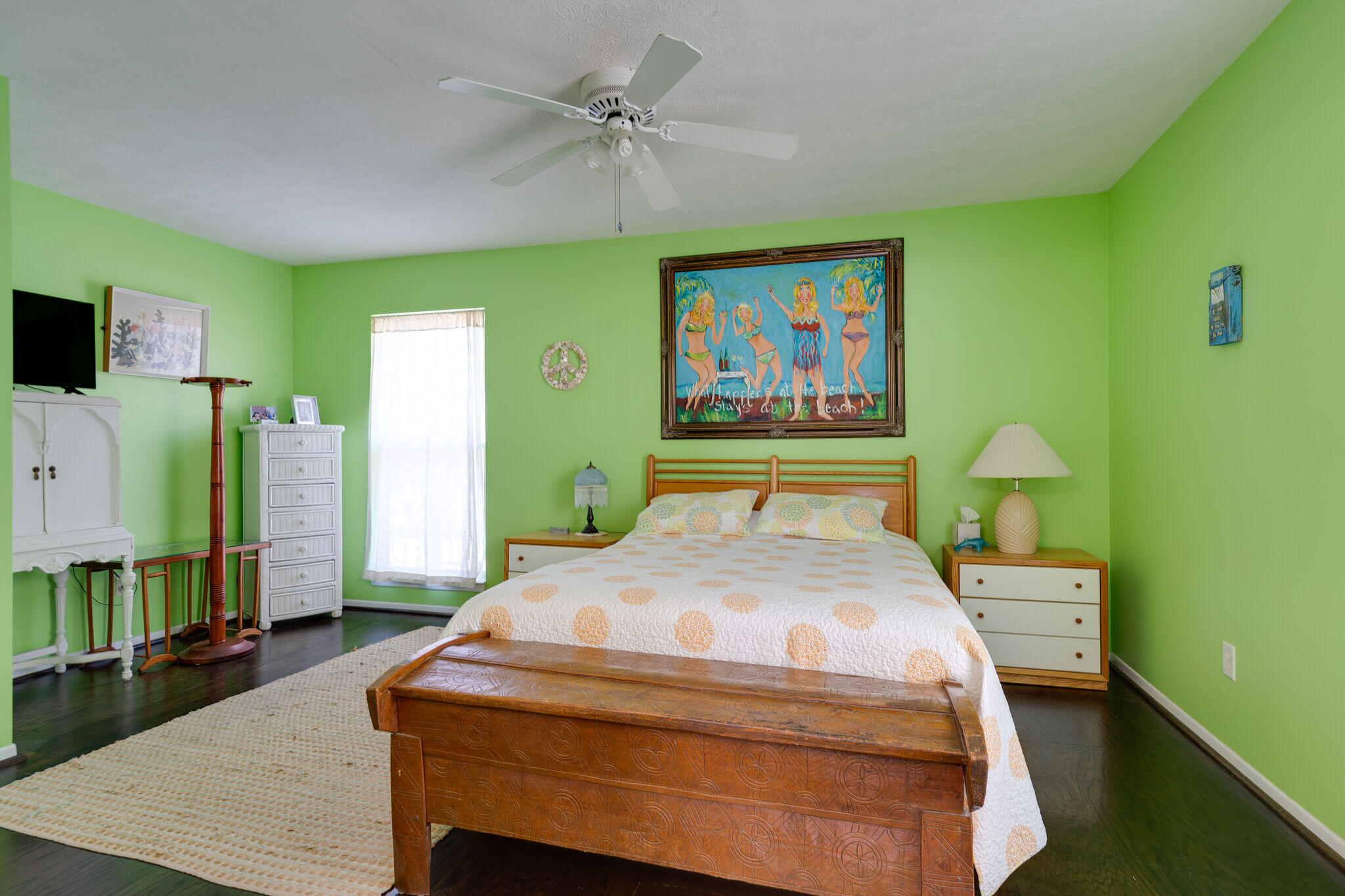 80 Buddy Street Santa Rosa Beach, FL 32459 - Photo 21 of 46 a bedroom with a bed and a flat screen tv
