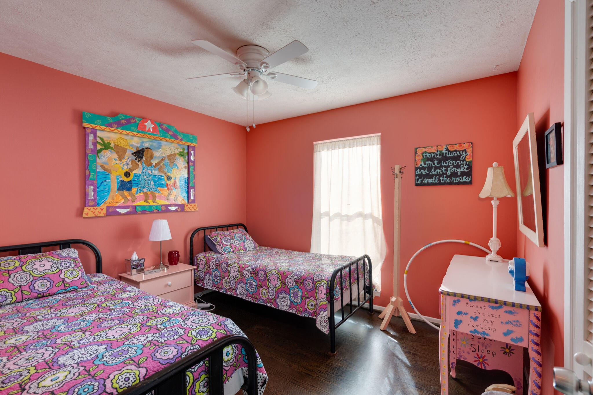 80 Buddy Street Santa Rosa Beach, FL 32459 - Photo 25 of 46 a bedroom with bed and wooden floor