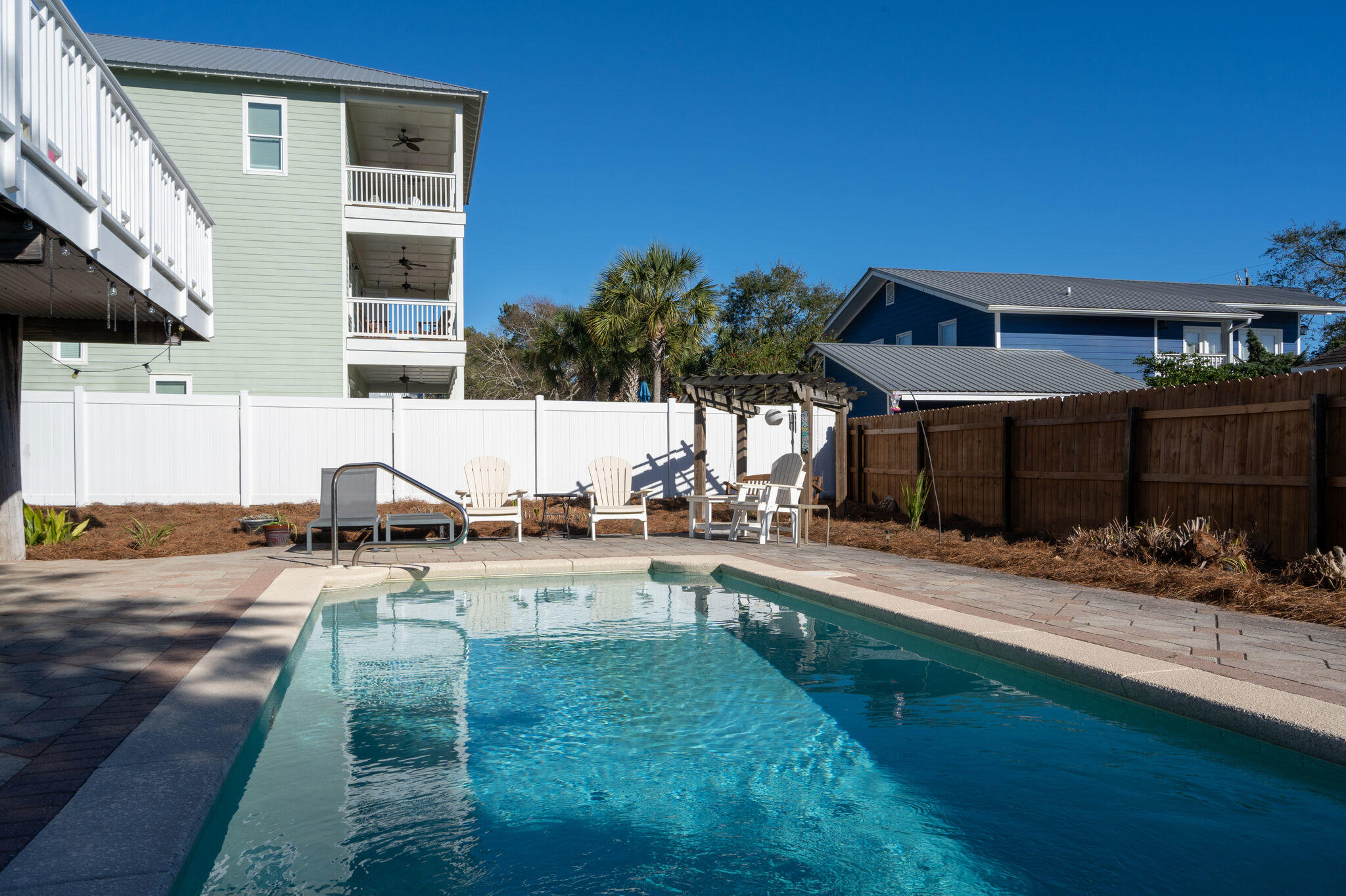 80 Buddy Street Santa Rosa Beach, FL 32459 - Photo 30 of 46 a view of a house with backyard and sitting area