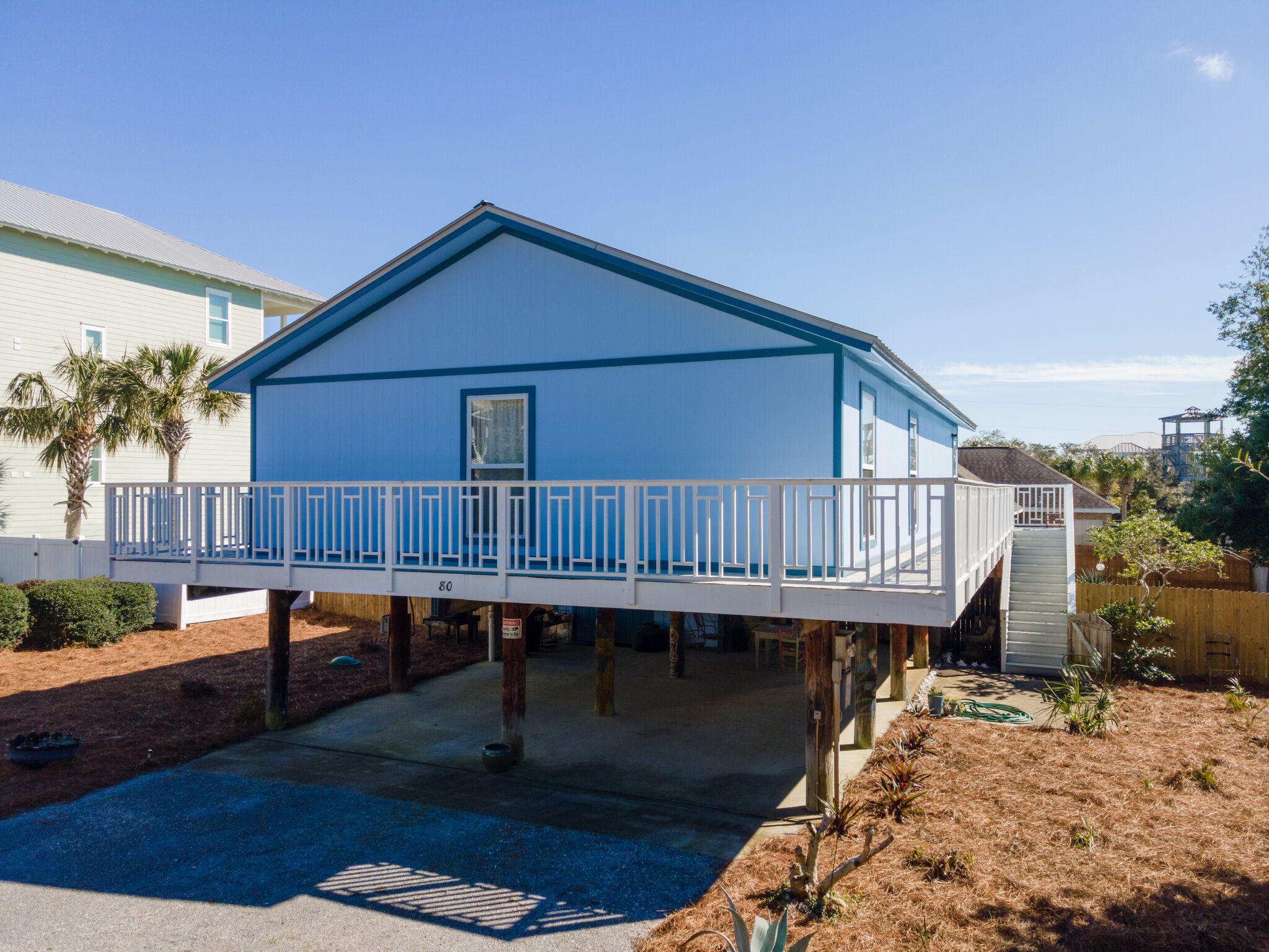 80 Buddy Street Santa Rosa Beach, FL 32459 - Photo 3 of 46 a view of a house with roof deck
