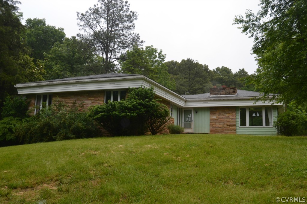 20168 Rockcastle Road Ruther Glen, VA 22546 - Photo 1 of 18 a front view of house with yard and green space