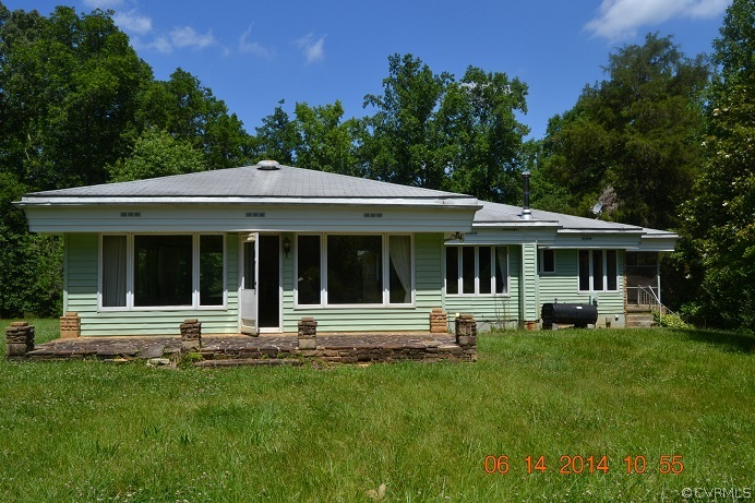 20168 Rockcastle Road Ruther Glen, VA 22546 - Photo 3 of 18 a front view of a house with a yard