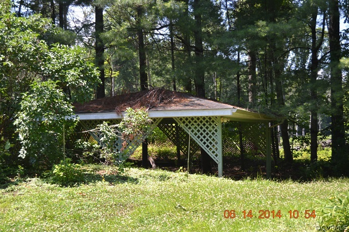 20168 Rockcastle Road Ruther Glen, VA 22546 - Photo 5 of 18 a view of a backyard