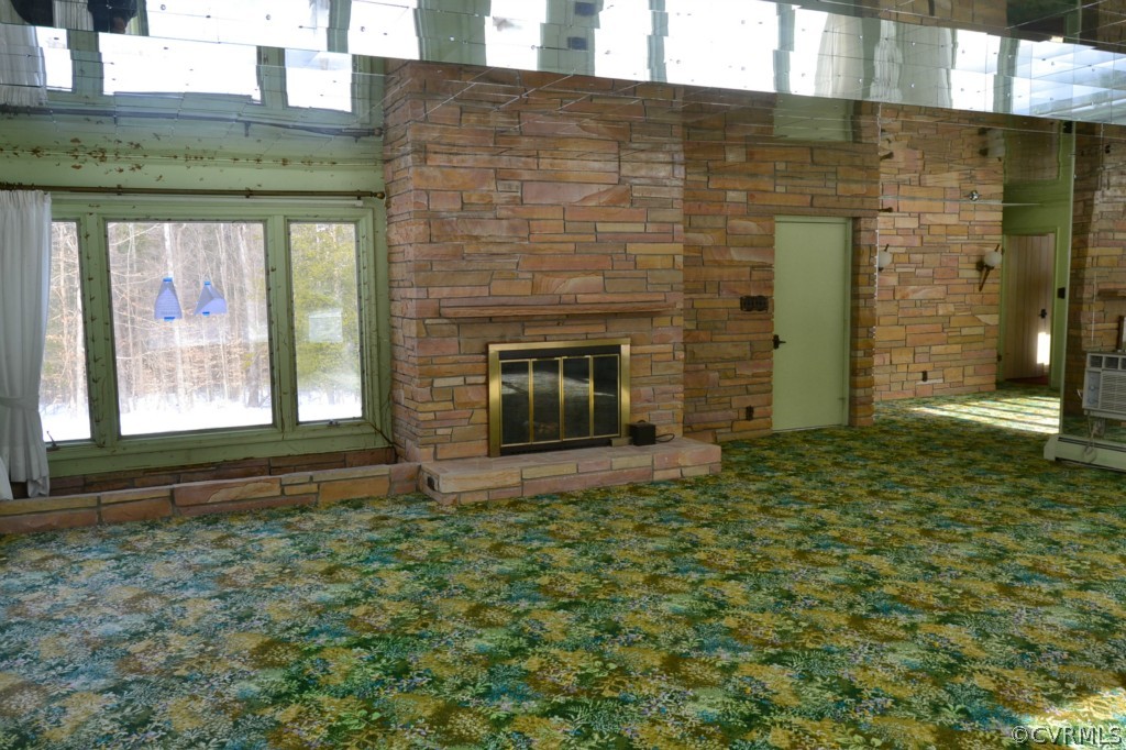 20168 Rockcastle Road Ruther Glen, VA 22546 - Photo 8 of 18 a front view of a house with a yard