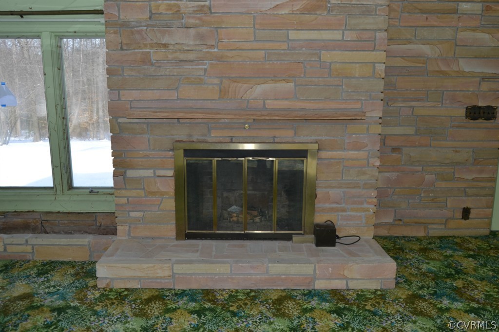 20168 Rockcastle Road Ruther Glen, VA 22546 - Photo 9 of 18 a stone fireplace with a sink
