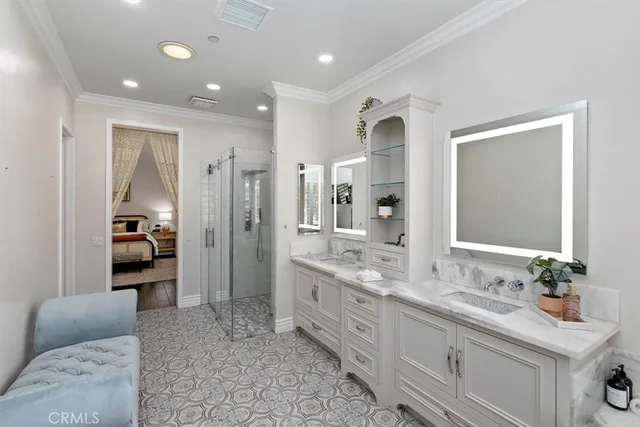 a view of a backyard with table and chairs with wooden fence