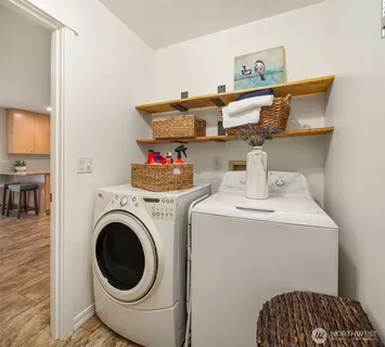 a utility room with dryer and washer