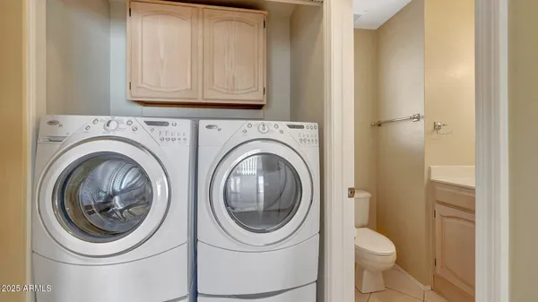 a bathroom with a toilet and a sink