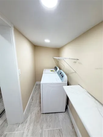 a utility room with washer and dryer