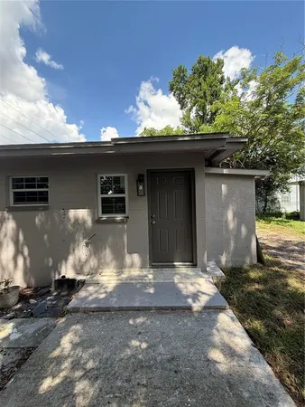a front view of a house with yard