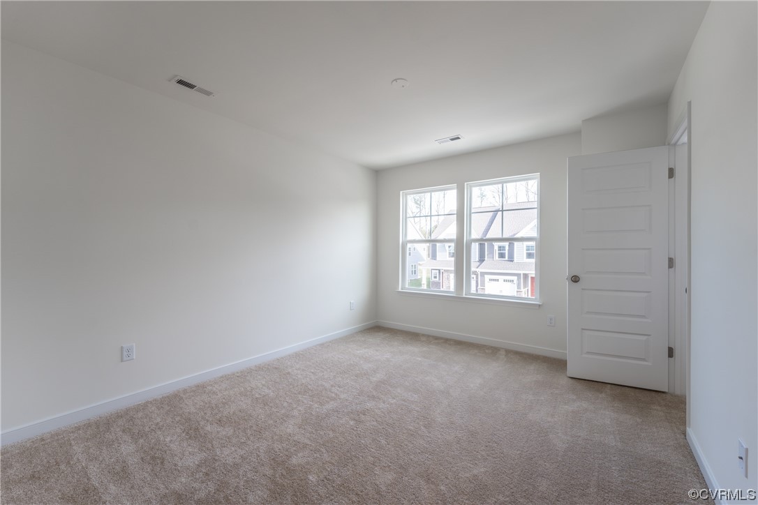 18609 Palisades Ridge Moseley, VA 23120 - Photo 18 of 50 an empty room with windows
